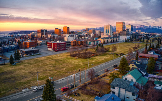 An aerial view of a sunset over Downtown Anchorage, Alaska in Spring